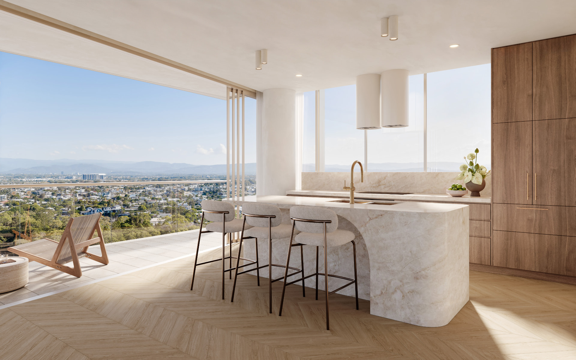 Kitchen island opening to terrace with hinterland views
