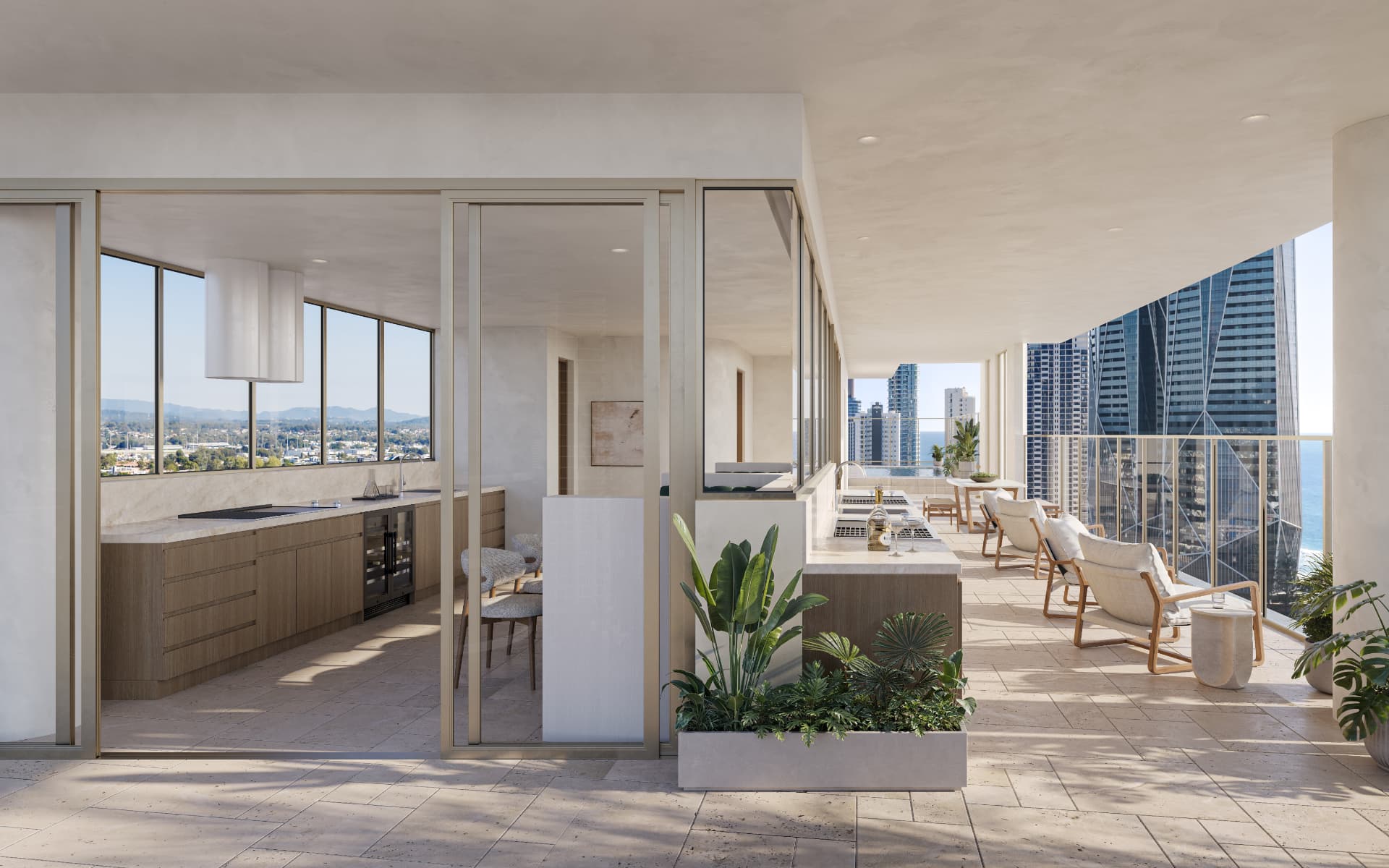 Residents' entertaining terrace and kitchen overlooking the coast